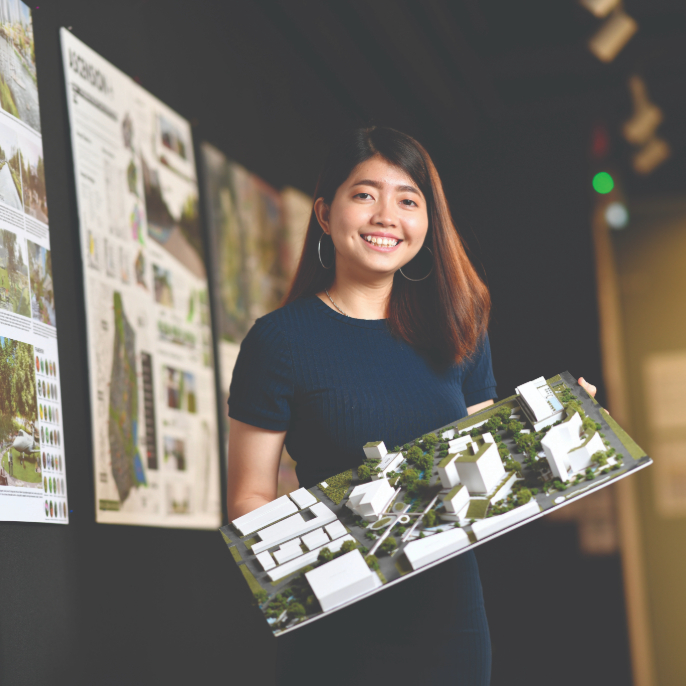 Student with Model of Project