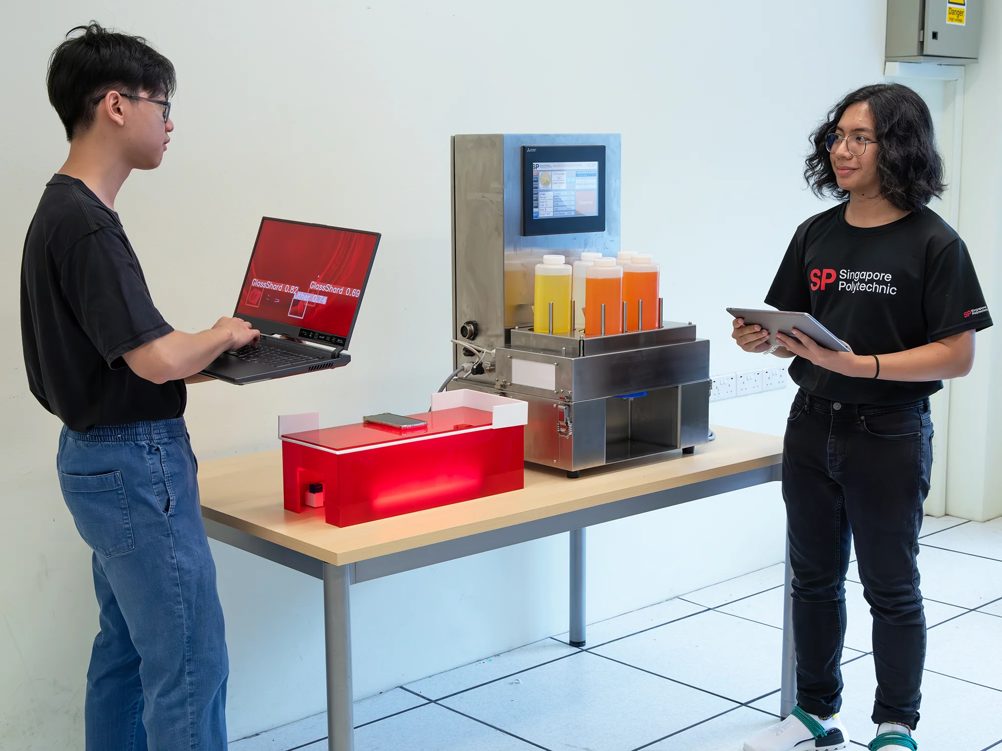 Students working on the project, writing the software codes.