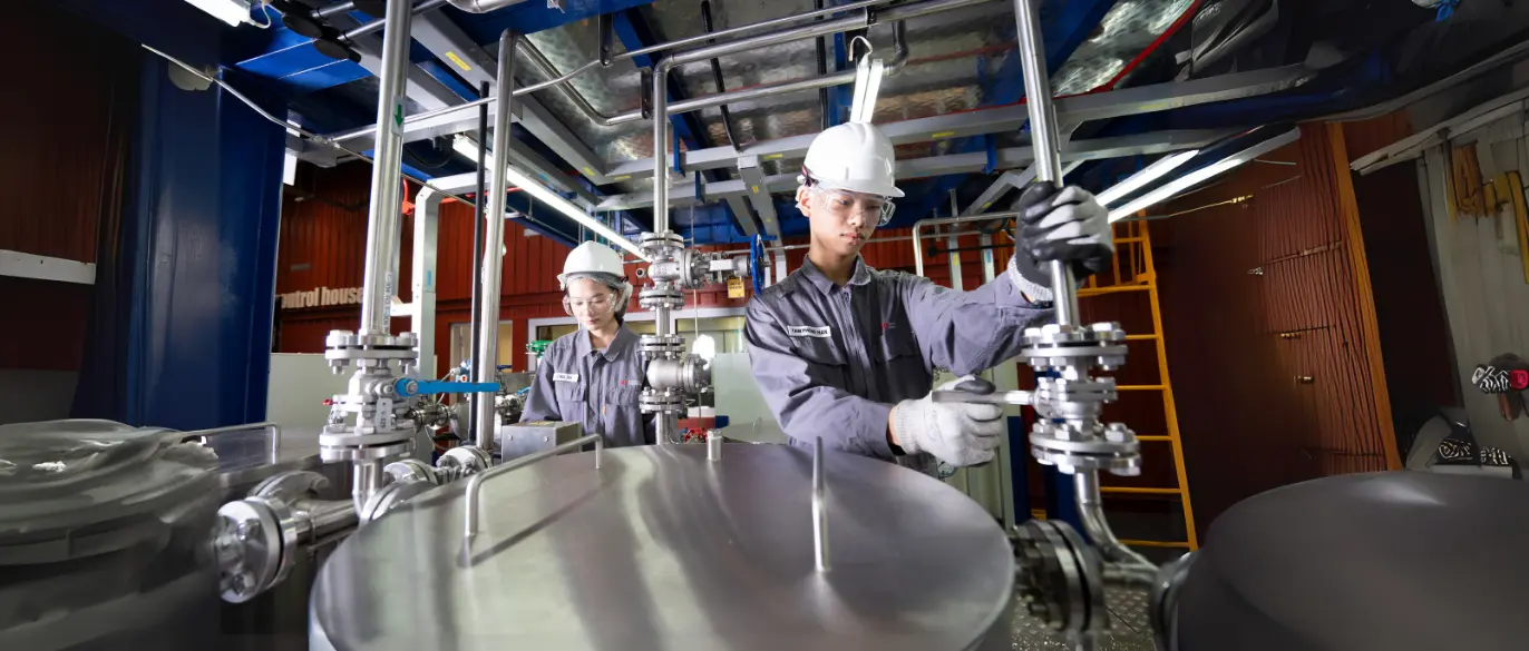 students in chemical plant