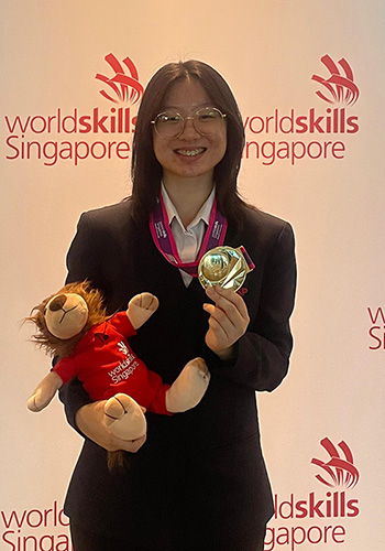 Abella with medal