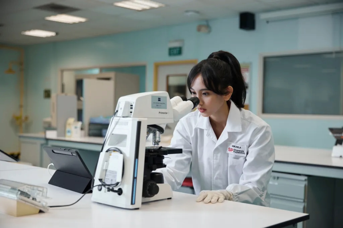 CLS-DAPC Student Using Microscope