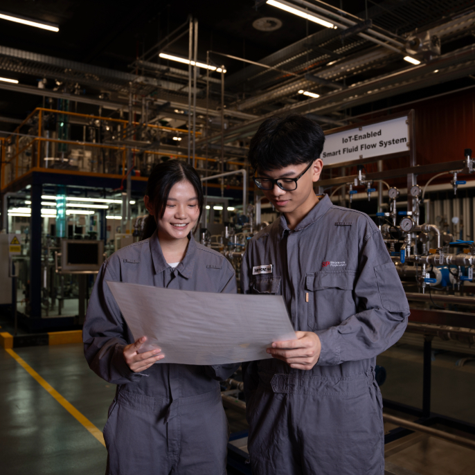 CLS-DCHE Students Looking at Blueprint-v01