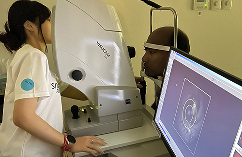 DOPT student conducting vision screening