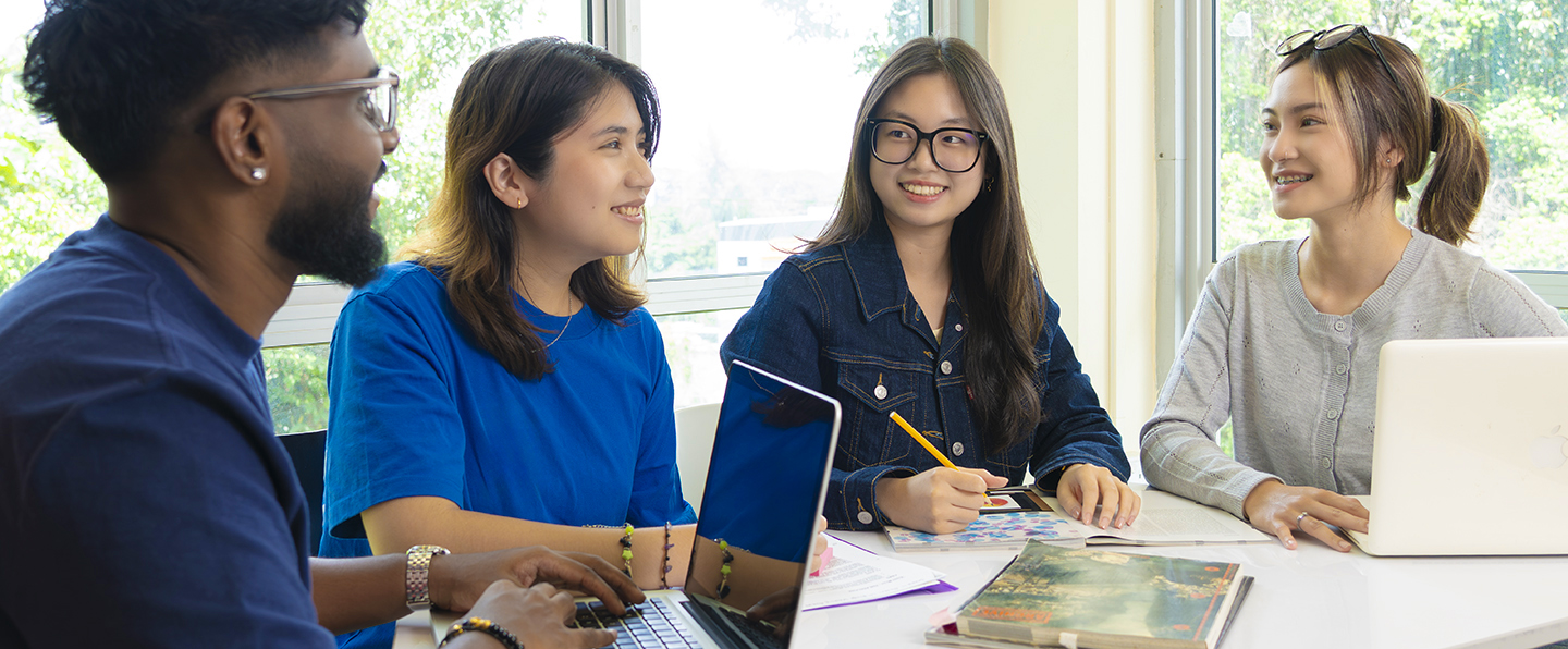 4 students having a discussion