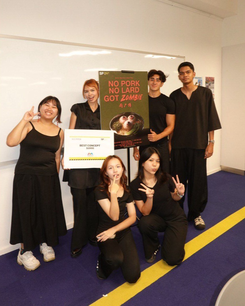 winners pose for a photo