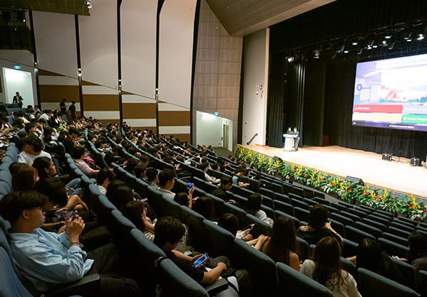 Students waiting in the hall for ceremony to start