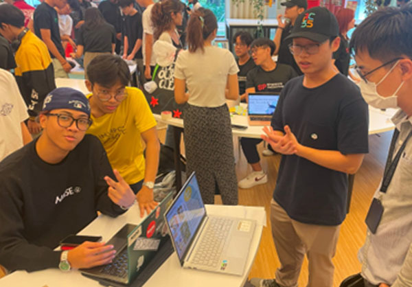 Students in their booth