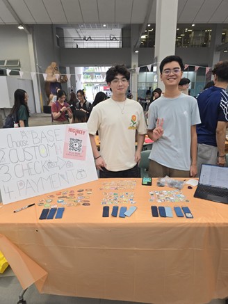 Business Essentials Through Action Students Selling Self-Made Items