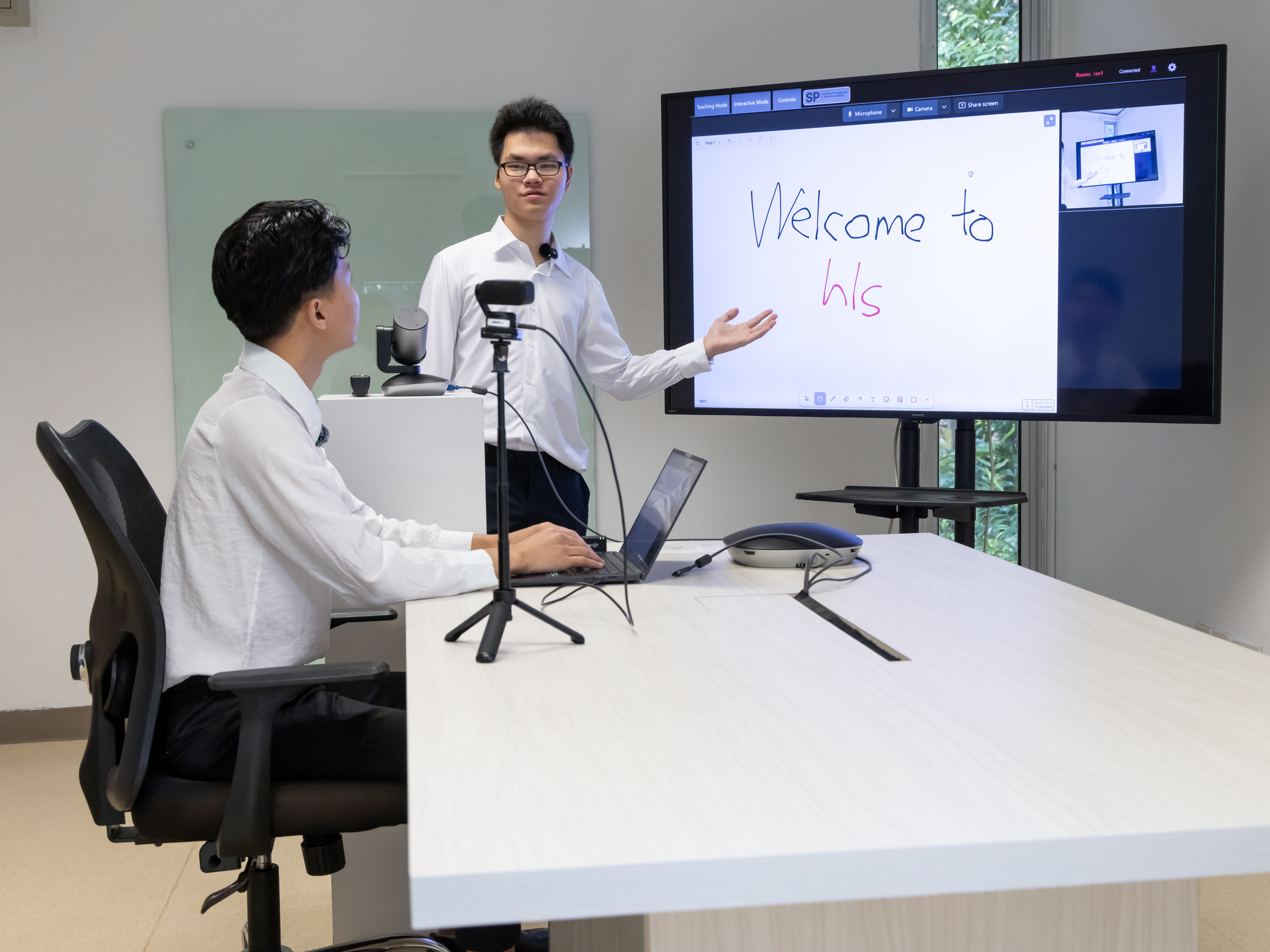 Students collaborating on an innovative SIWMA project, fostering teamwork and creativity.