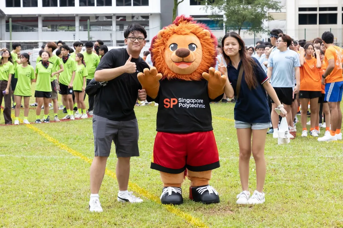 student with mascot