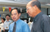 Mr Tan Kay Yong (left) image